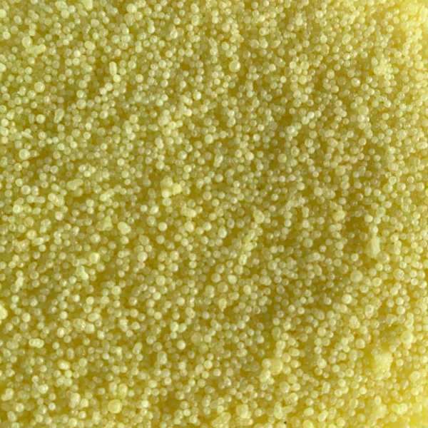 Butterscotch Crunch pearl candle with yellow textured wax beads